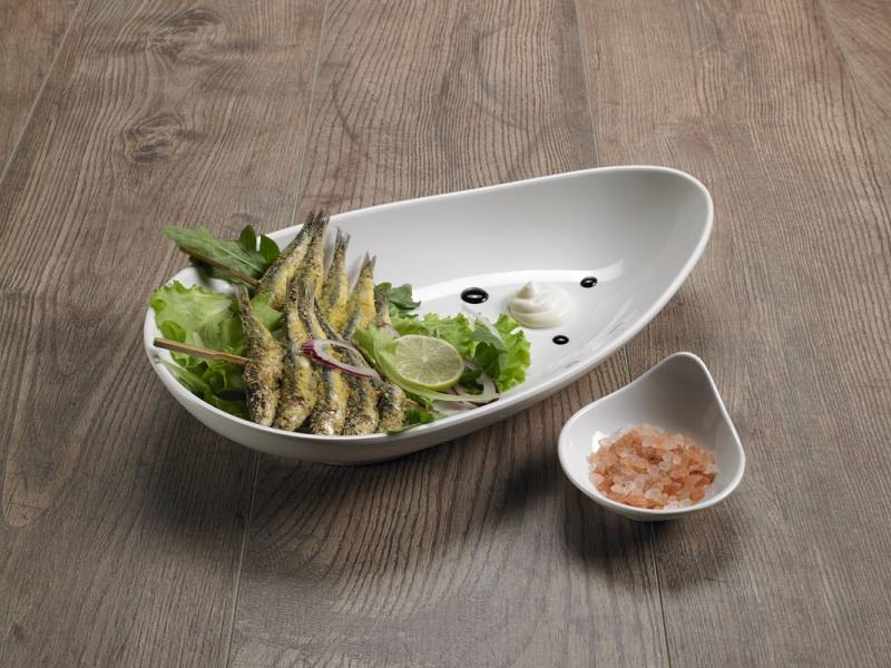 Piatto ovale in melamina bianca