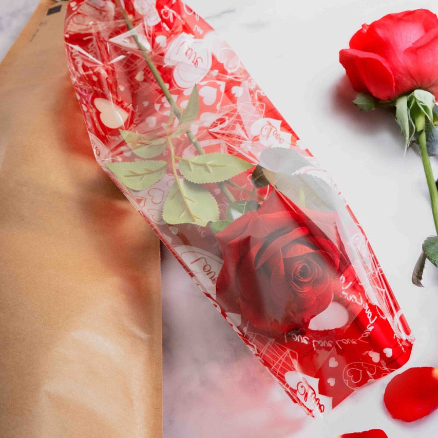 Spezzoni Cellophane Fondo Cuori Rossi